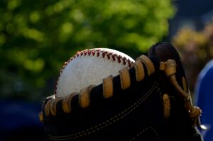 Pictured: Baseball in a glove.