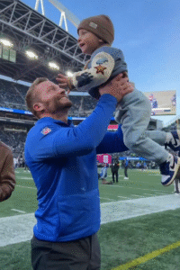 A Super Bowl-Like Memory blog post by Ken Walker Writer. Pictured: A screenshot of Coach McVay with his son during the recent game against the Seahawks.