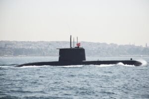 Humans Needed in the Loop of Life blog post by Ken Walker Writer. Pictured: A submarine.